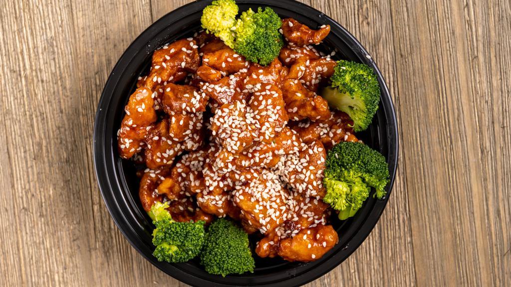 Sesame Chicken · With broccoli and steam rice.