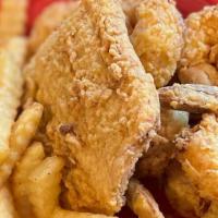 Fried Seafood Platter · Served with fried shrimp, scallops, salmon and fries.