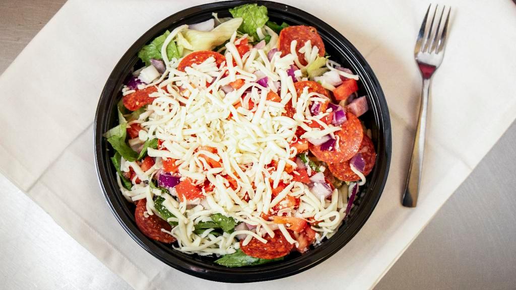Regular Antipasto Salad · Romaine and Iceberg lettuce, ham, pepperoni, red onions, green peppers, tomatoes, and mozzarella cheese with Italian dressing.