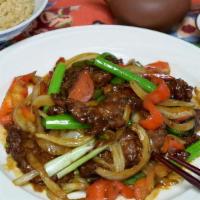 Beef Mongolian Style · Scallions, red peppers and onions, and tangy hoisin sauce.