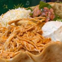 Taco Salad · Large crispy flour tortilla shell filled with shredded chicken or ground beef, lettuce, shre...