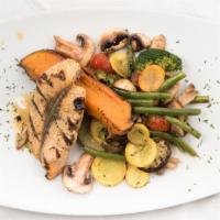 Grilled Salmon Arancio · Grilled in orange sauce. Served with sautéed fresh veggies and baked sweet potato.