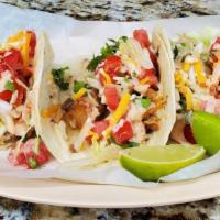 Chicken Chipotle Taco · Spicy. 3 pieces grilled chicken cubes cooked on our chipotle cream sauce, fresh tomatoes cil...