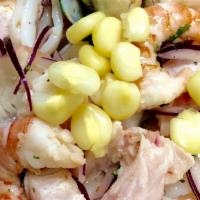 Ceviche Mixto · Raw fish and seafood marinated in lime juice.