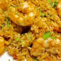 Arroz Con Camarones · Peruvian style paella rice with seasoned shrimp.