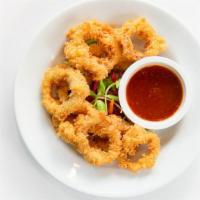 Fried Calamari · 15 pieces of perfectly cooked calamari, served battered and fried to a golden crisp.