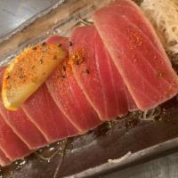 Tuna Tataki · Thin sliced of seared tuna, served with ponzu sauce.