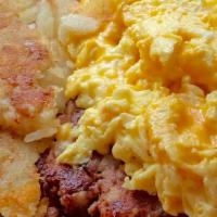 Corned Beef Hash & Eggs · *May be cooked to order. Consuming raw or undercooked meat, poultry, seafood, shellfish or e...