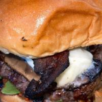 Vista Burger · 8 oz mushroom, arugula, sun-dried tomato spread, heirloom tomato, mozzarella, hand-cut fries.