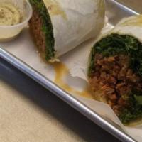 Hot Mess Wrap · Spinach wrap stuffed with meatless sloppy Joe, vegan gouda cheese, kale, onions, peppers, to...