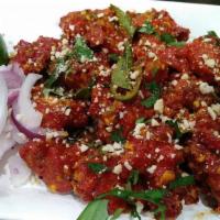 Chicken 999 · Boneless chicken fried and tossed with green chillies, curry leaves and spices.
