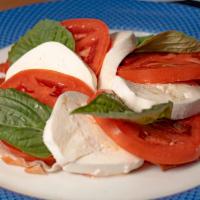 Insalata Caprese · 4oz fresh mozzarella, prosciutto di parma, vine-ripened tomatoes and fresh basil