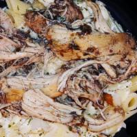 Jerk Chicken Pasta Bowl · Spicy. Jerk Chicken ,bell peppers, onions on a bed of penne pasta in a creamy alfredo sauce.