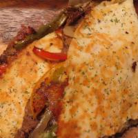 Steak & Cheese Quesadilla · Steak, grilled bell peppers & onion, cheese and zesty bestie sauce.