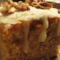 Banana Nut Cake · Delicious banana nut cake with  pecans and cream cheese icing.