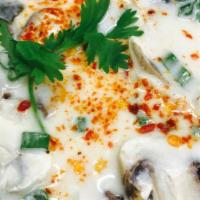 Tom Kha Gai Soup · Chicken soup. Famous Thai creamy soup with lemongrass, galangal, mushrooms and scallion.