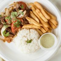 🥩 Lomo Saltado · Sautéed beef, tomatoes, and onions seasoned with French fries and white rice.