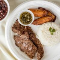 🥩 Churrasco Miami 305 Style · Skirt steak comes with rice and beans. Served with one side order of tostones, yuca croqueta...