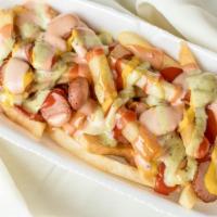 *Large Salchipapa (Peruvian Style) · French fries topped with slices of hot dog and all our specialty sauce.
