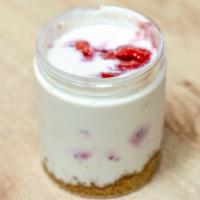 Strawberry Cheesecake · Strawberry Cheesecake with a Gluten Free graham crust and strawberry coulis.