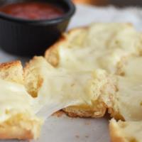 Garlic Bread W Chz · Garlic butter spread with melted mozzarella cheeses. Served with marinara sauce.