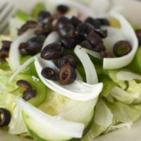 Veggie Salad · Iceberg lettuce, tomato, cucumber, onions, green peppers and black olives.