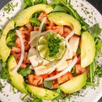 Italian Salad · Arugula, tomato, onion, avocado, and heart palm.