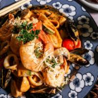 Pappardelle Seafood · Shrimp, calamari, mussels, zuchhini, cherry tomatoes, mushroom, Panang curry parmesan cream ...