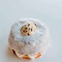 Cookie Dough Doughnut · Raised doughnut topped with vanilla glaze and a scoop of chocolate chip cookie dough.