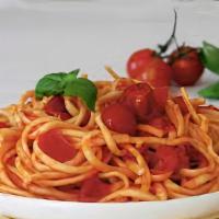 Tonnarelli Pomodoro E Basilico · Homemade Tonnarelli pasta, Fresh tomatoes and basil, parmigiano