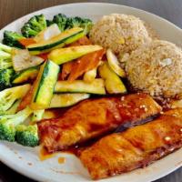 Hibachi Salmon · Served with cabbage and fried rice with two sauces.