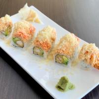 Snow Mountain Roll · Shrimp tempura, mango, topped with kani and special sauce.