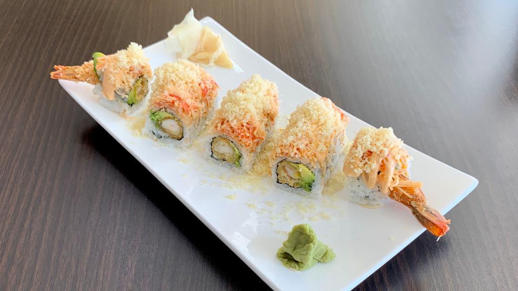 Snow Mountain Roll · Shrimp tempura, mango, topped with kani and special sauce.