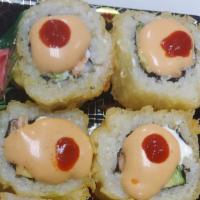 Tnt Roll · Deep fried roll with tuna, salmon and avocado with special sauce.