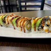 Spicy Tiger Roll · Spicy. Shrimp tempura, spicy tuna topped with fresh salmon and wasabi and chef's sauce.