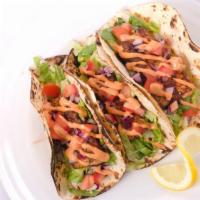 Fresh Mahi Tacos · Three tacos filled w blackened, grilled or fried mahi topped w cabbage, lettuce, red onion a...