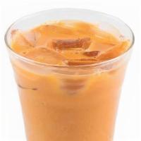 Thai Tea · A strongly brewed fermented black tea topped with half-and-half.