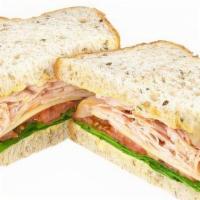 Turkey Bacon Cold Sandwich · Smoked turkey, bacon, Swiss cheese, spinach, sliced tomato, mayonnaise, and Dijon mustard on...