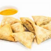 Samosa · Ubiquitous throughout India, our version of the popular vegetarian staple features mashed ch...