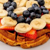 Protein Vegan Waffle · Served with blueberry, strawberry, banana, honey.