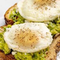 Avocado Toast · Served with two eggs, two toast, and guacamole.