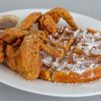 Chicken & Waffles · Served with syrup.