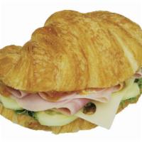 Bistro Ham & Cheese Sandwich · Sliced Ham,Swiss Cheese,, thinly sliced cucumber,Lettuce & Honey brown mustard on a Croissant.