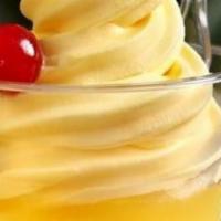 Dole Soft Serve Pineapple Float · Dole Pineapple Sorbet served in a 16 oz. cup with pineapple juice and topped with a cherry!