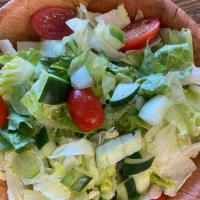 Side Salad · Romaine and iceberg lettuce, roma tomatoes, diced cucumber with house made white balsamic vi...
