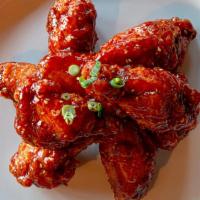 Sweet & Spicy Fried Chicken · Seasoned sweet & spicy fried chicken wing, served with radish pickle.