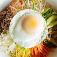 Bibimbap · Rice bowl with mixed veggies topped egg and beef, served with veggie banchan.