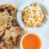 Pupusas · Is a thick, hand­made corn tortilla that is stuffed with one or more of the following: 
Pupu...