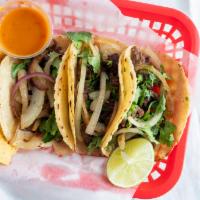 Soft Tacos (Tacos Mexicanos) · Three tacos in a steamy corn tortilla with your choice of filling, diced onions, cilantro an...