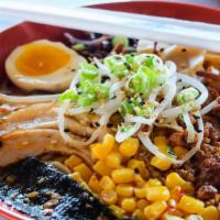 Spicy Tan Tan Noodles · Spicy creamy pork broth, seasoned ground pork, pork belly, noodles, sweet corn, black mushro...